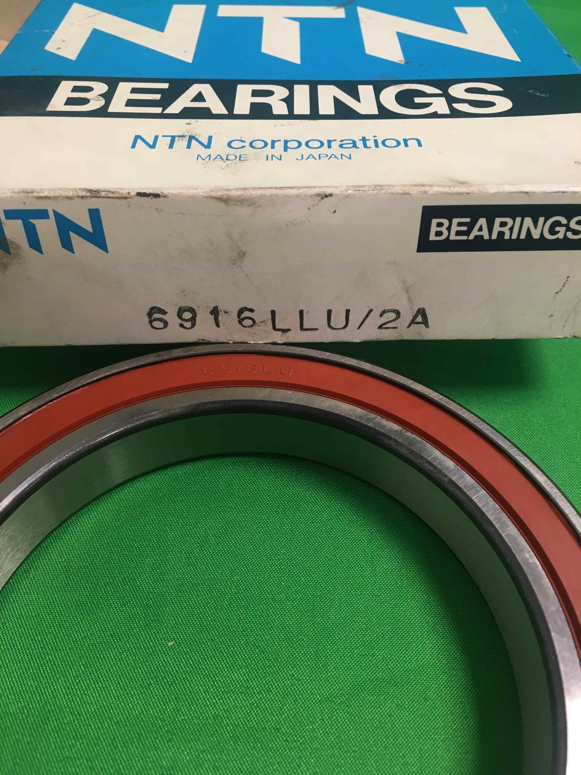 7702